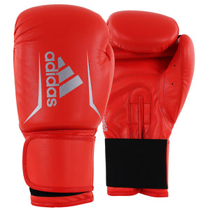 Red boxing gloves with Adidas logo on a white background