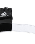 Black and white adidas grappling training glove.