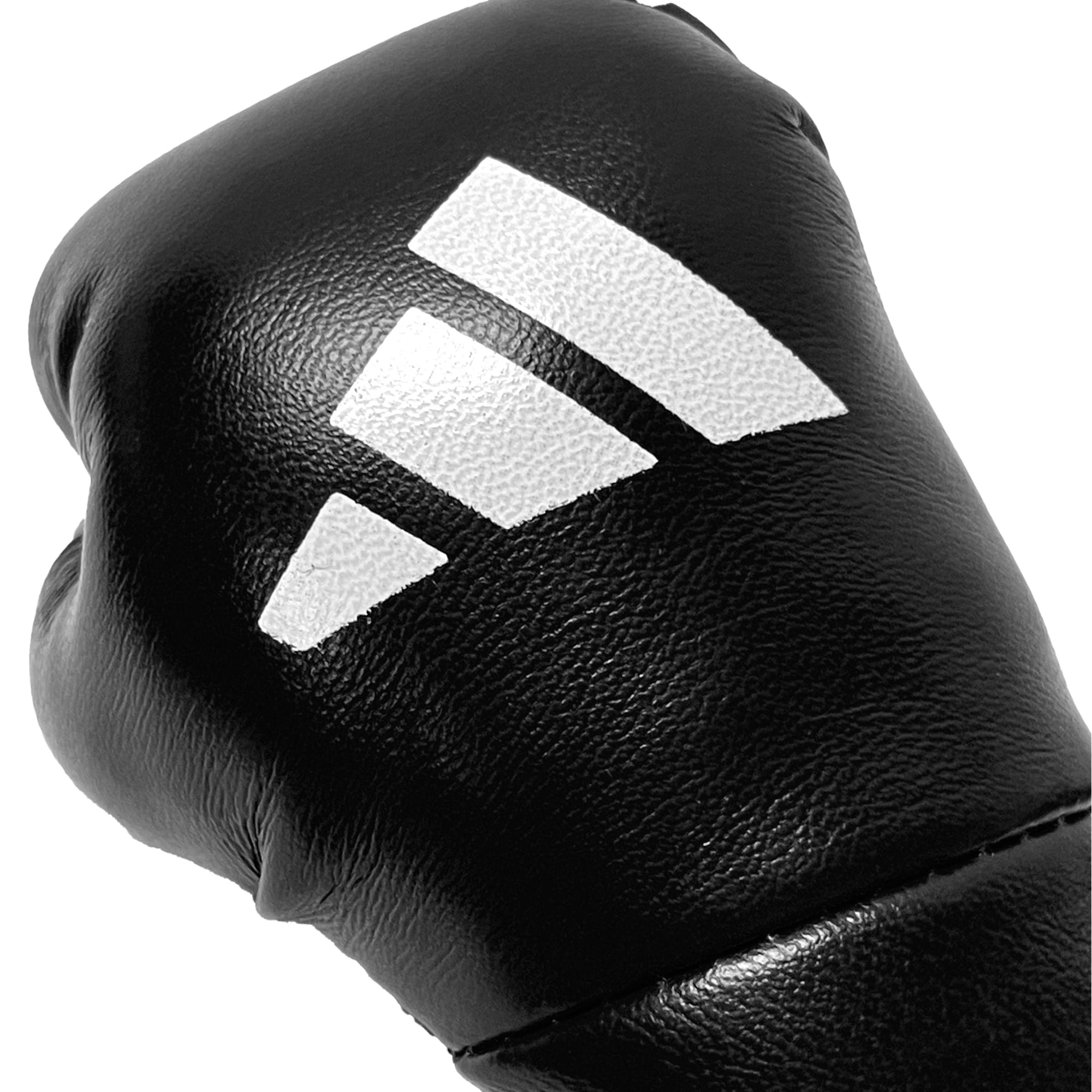 Black boxing glove with white stripes.