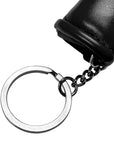 Close up of adidas mini keychain with black boxing glove.