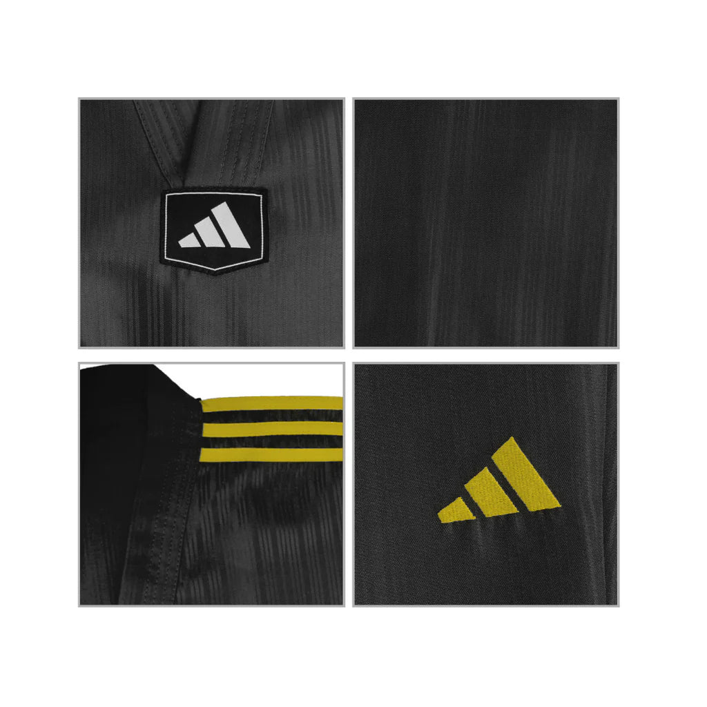 Close-up of a black sports jacket with Adidas logos and details.