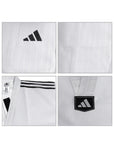 White martial arts uniform with Adidas logo and branding on a white background