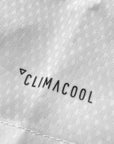 Close-up of fabric texture on Adidas taekwondo uniform.