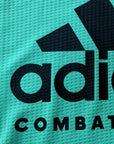 Close-up of Adidas logo on teamwear.