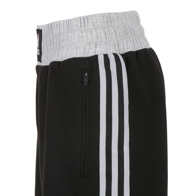 Black and white adidas boxing shorts with white stripes, size S.