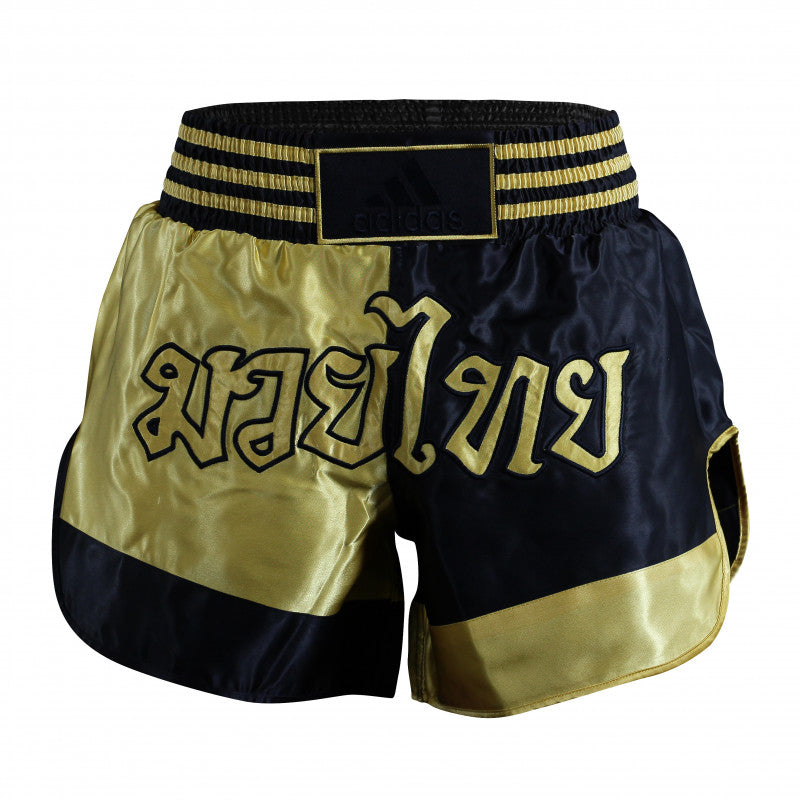 Black Thai boxing shorts with a logo.