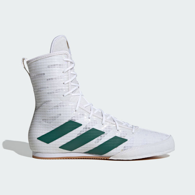 A pair of white and green boxing boots with lace-up closure and prominent green stripes on the side.