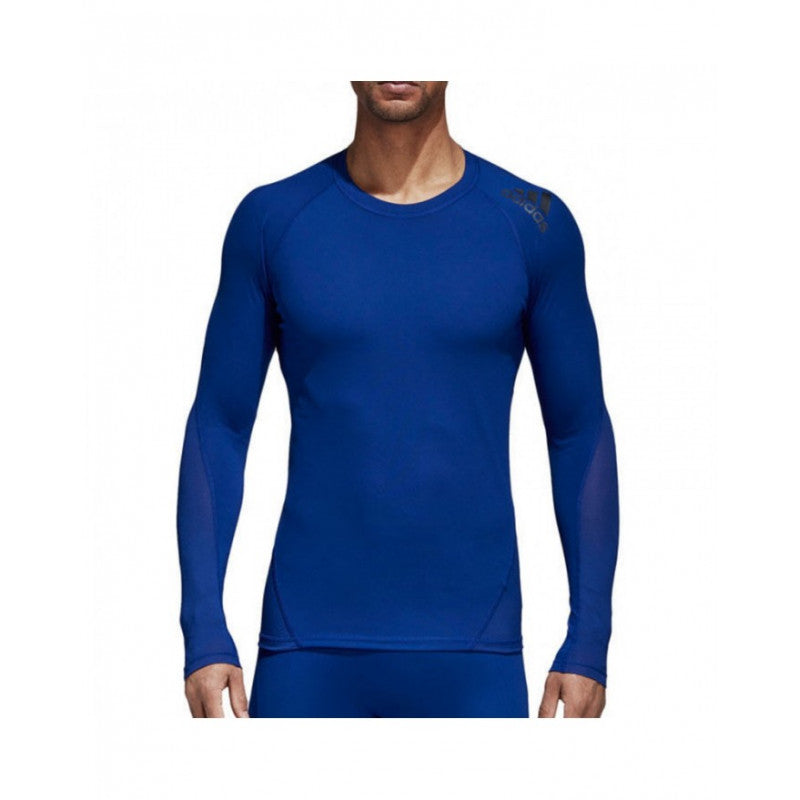 Man wearing adidas rashguard in blue.