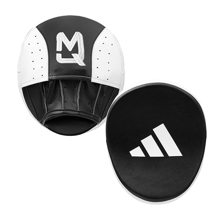 Black and white training pads with MQ and Adidas logos on a white background