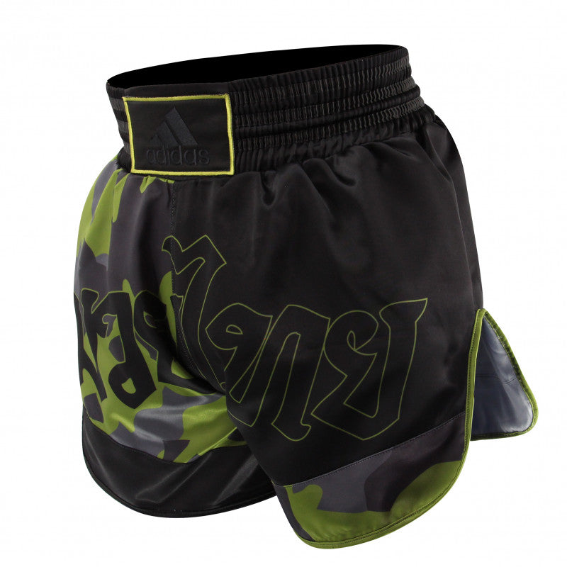 Black and green Thai boxing shorts.