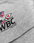 Grey t-shirt with logo, close-up view.