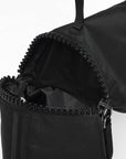 Black adidas Camo Military Sack Bag with zipper, close-up view.