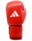 Red boxing glove with Adidas logo on a white background