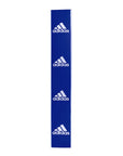 Blue adidas boxing ring corner pad with white text.