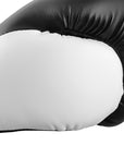 Close-up of black and white boxing glove by Adidas Hybrid 150.