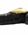 Single black and gold adidas Adi-Power Hybrid 500 Pro Boxing Glove.