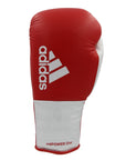 Red and white Adidas Adi-Power Hybrid 500 boxing glove.