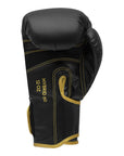 Black boxing glove with yellow trim, Adidas Hybrid 80, 6 oz.