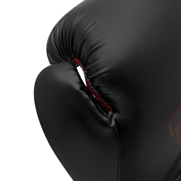 Close-up of Adidas Hybrid 80 black and red boxing glove.