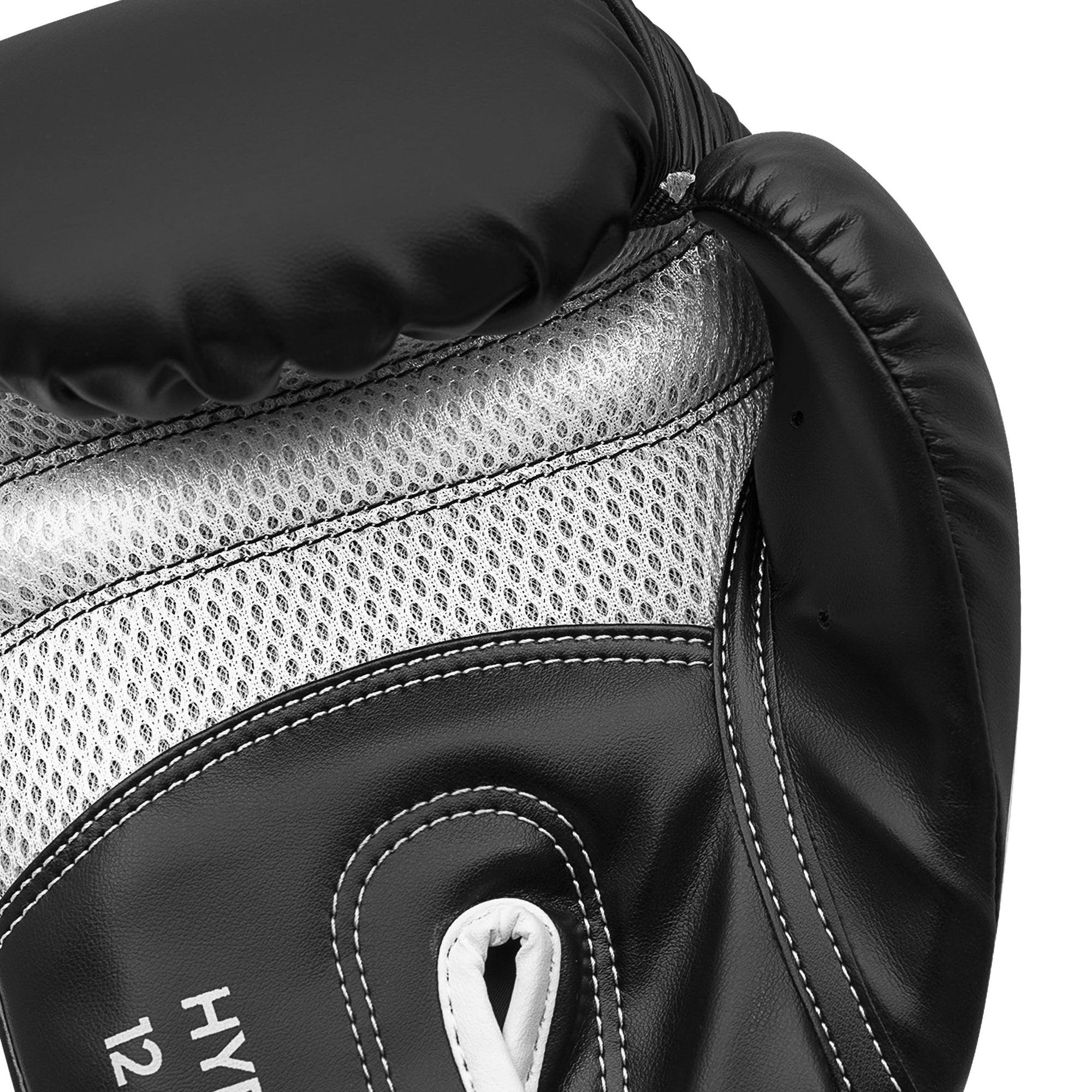 Close-up of Adidas Hybrid 80 black and white boxing glove.