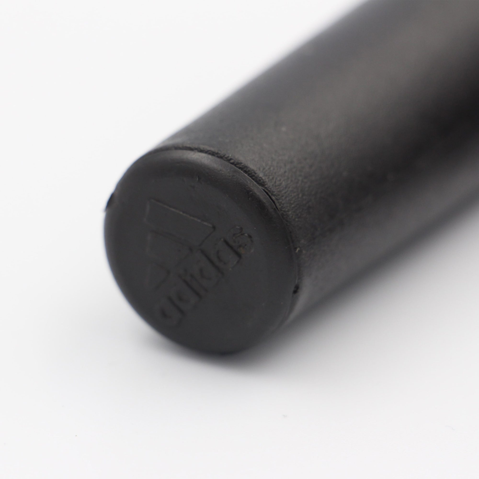 Close-up of a black Adidas jump rope highlighting the design details.