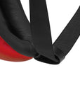 Close-up of a red and black strap on a white background