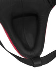 Close-up of a black helmet with red interior on a white background