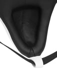 Close-up of a black and white seat with a strap on a white background