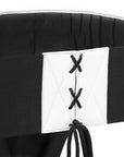 Black belt with white label and black laces on a white background