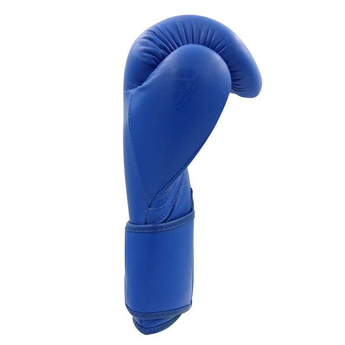 Blue adidas Speed 175 boxing glove on white background.