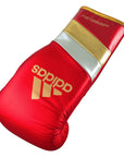 Red glove with gold and silver stripes, Adidas branding, 14 oz.