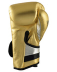 Gold boxing glove for boxing or kickboxing.