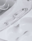 Close-up of Adidas white head guard with face mask.