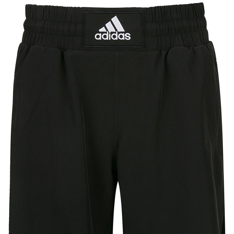 Pair of black Adidas BOXWEAR TECH shorts, thigh-length inner lining.