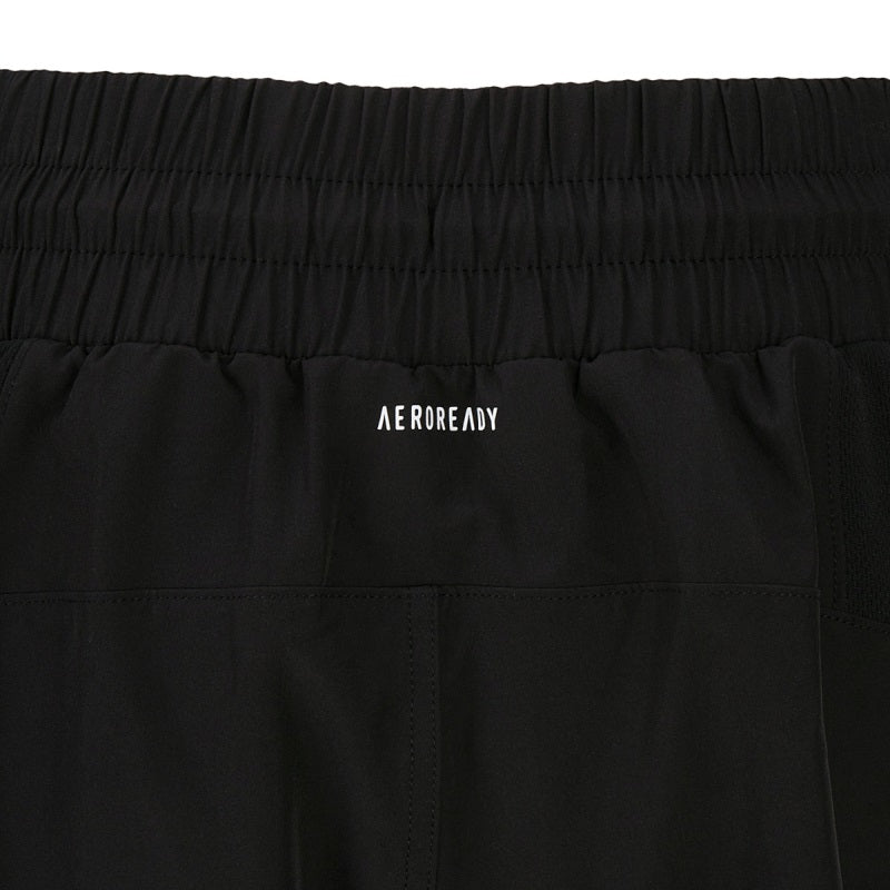 Close-up of black Adidas BOXWEAR TECH shorts, thigh-length inner lining.