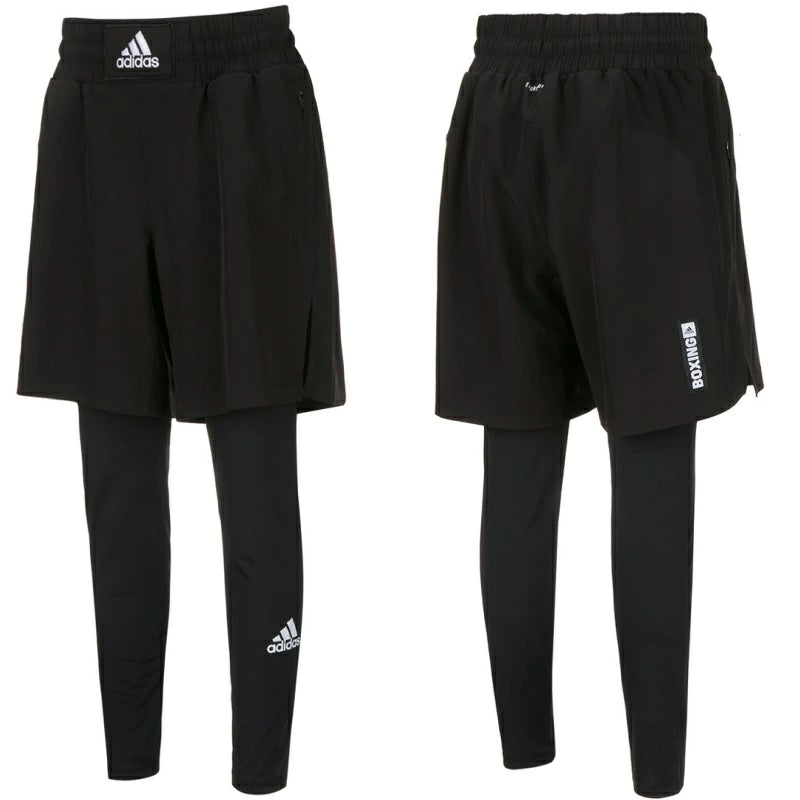 Black boxer shorts with full-length inner lining by Adidas.