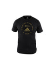 Black Adidas shirt with yellow text, slim fit.