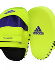 Yellow boxing mitt with blue and purple design.