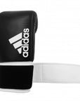 Black and white boxing glove, adidas Hybrid 200.