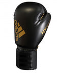Black and red adidas Hybrid 50 boxing glove.