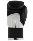 A black and white Adidas Hybrid 100 boxing glove, 10 oz weight.