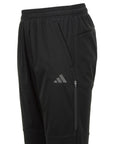 Black shorts with a logo on the side.