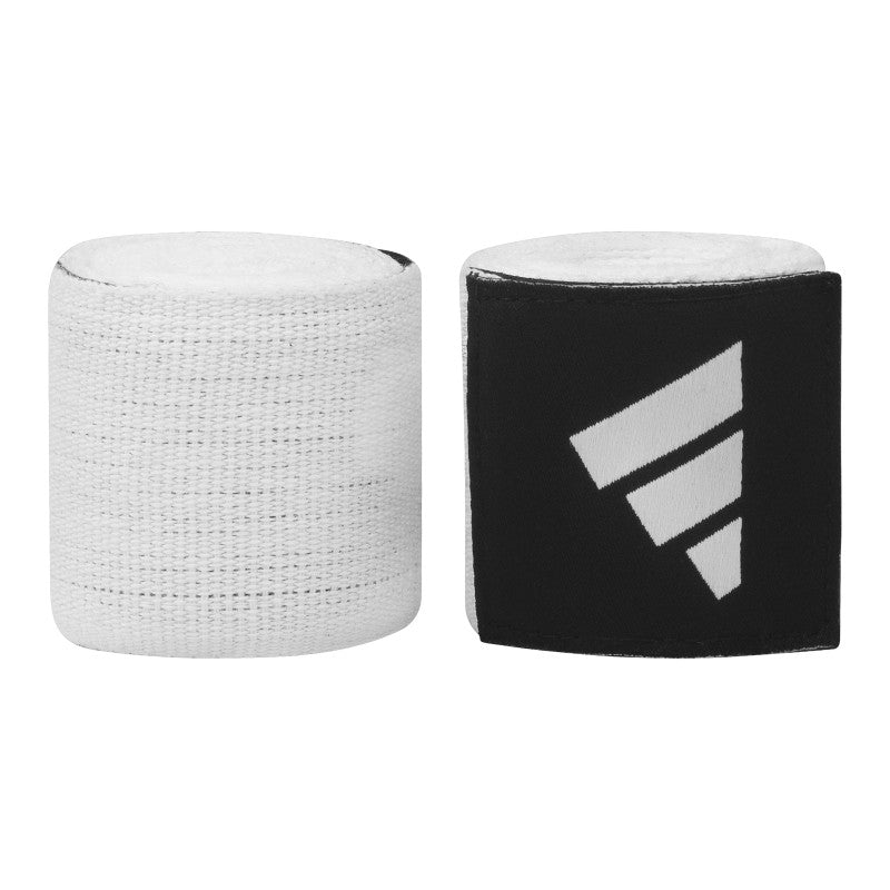 Close-up of two rolled boxing hand wraps.