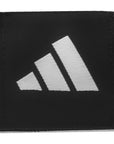 black adidas hand wrap with logo on white background