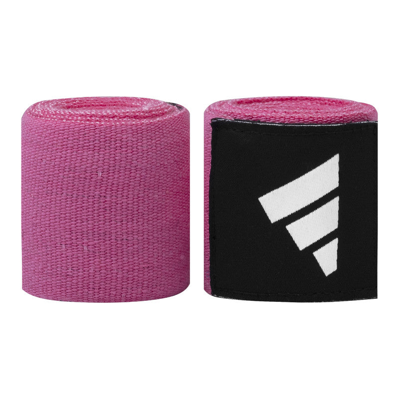 Close-up of pink and black boxing hand wrap in a roll.