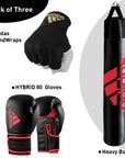 Black boxing gloves resting on a punching bag.