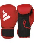 Red boxing gloves with a white logo on a white background