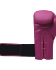 Pink boxing glove with black band for boxing.