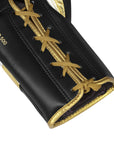 Black and gold boxing glove, Adidas Adi-Speed 500.