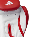 White boxing glove with red accents and Adidas logo on a white background